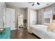 Bedroom with hardwood floors, natural light, and a view of the closet at 504 Angier Ne Ave, Atlanta, GA 30308