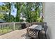View of the outdoor deck with a grill, dining table, and chairs, perfect for entertaining guests at 504 Angier Ne Ave, Atlanta, GA 30308
