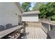 Outdoor deck featuring a dining table with seating, ideal for enjoying meals outdoors at 504 Angier Ne Ave, Atlanta, GA 30308