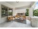 Relaxing covered front porch with comfortable seating and stylish outdoor rug at 504 Angier Ne Ave, Atlanta, GA 30308