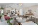 Open living room with modern furniture and hardwood floors, flowing into the kitchen at 504 Angier Ne Ave, Atlanta, GA 30308