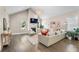 Bright living room with vaulted ceilings, hardwood floors, and a cozy fireplace at 504 Angier Ne Ave, Atlanta, GA 30308