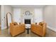 Sitting area features a fireplace, hardwood floors, and two chairs at 504 Angier Ne Ave, Atlanta, GA 30308