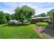 Large backyard with multiple outbuildings for storage, offering ample space and functionality at 81 Laurie Ct, Hiram, GA 30141