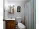 Bathroom featuring vanity with light-colored walls and a shower/tub combo at 81 Laurie Ct, Hiram, GA 30141