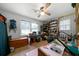 Bedroom featuring ceiling fan, carpet floor, and two windows for great natural light at 81 Laurie Ct, Hiram, GA 30141