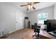Bedroom with carpet flooring, a ceiling fan, and a view to a backyard at 81 Laurie Ct, Hiram, GA 30141