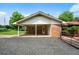 Detached brick carport providing convenient covered parking and storage at 81 Laurie Ct, Hiram, GA 30141