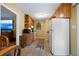 Cozy kitchen featuring tile flooring, wood cabinets and white appliances at 81 Laurie Ct, Hiram, GA 30141