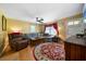 Spacious living room featuring ample seating, a ceiling fan, and hardwood floors at 81 Laurie Ct, Hiram, GA 30141