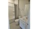 The bathroom is equipped with a shower-tub combination, a standard toilet and tile flooring at 105 Marchmont Dr, Locust Grove, GA 30248