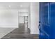 Inviting entryway with wood-look flooring and an open floor plan at 105 Marchmont Dr, Locust Grove, GA 30248