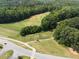 Beautiful aerial image of a golf course with lush greenery and tree-lined fairways at 14 Augusta Way, Hiram, GA 30141