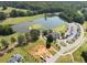 Stunning aerial view of the golf course featuring a water hazard and lush green fairways at 14 Augusta Way, Hiram, GA 30141