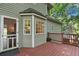 Exterior view of a home's deck space and door leading into the house at 14 Augusta Way, Hiram, GA 30141