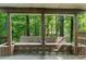 Exterior view of a covered wooden deck with seating at 14 Augusta Way, Hiram, GA 30141