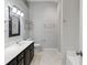 Well-lit bathroom featuring a vanity with storage and a convenient shelf with neutral wall color at 14 Augusta Way, Hiram, GA 30141