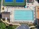 Aerial view showcases the pool, seating area, and landscaping for community enjoyment at 14 Augusta Way, Hiram, GA 30141