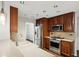 Kitchen features stainless steel appliances and natural lighting at 14 Augusta Way, Hiram, GA 30141