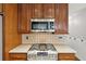 Kitchen with stainless steel appliances and tile backsplash at 14 Augusta Way, Hiram, GA 30141