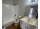 Bathroom featuring a shower-tub combo and vanity at 2994 Abbotts Oak Way, Duluth, GA 30097