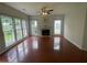 Spacious living room with hardwood floors, a fireplace, and lots of natural light at 2994 Abbotts Oak Way, Duluth, GA 30097