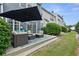 Charming backyard with an outdoor patio and a well-manicured lawn at 110 Finchley Dr, Roswell, GA 30076