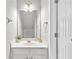 Bathroom with white vanity, sink, and large mirror at 110 Finchley Dr, Roswell, GA 30076