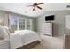 Stylish bedroom featuring modern decor, large windows, and plenty of natural light at 110 Finchley Dr, Roswell, GA 30076