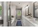 Bright bathroom features double vanity, soaking tub, and glass-enclosed shower at 2751 Pilgrim Mill Rd, Cumming, GA 30041