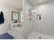 Bathroom with soaking tub and a glass shower with white subway tile at 2751 Pilgrim Mill Rd, Cumming, GA 30041