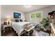 Cozy bedroom with a bed, window, and desk, perfect for relaxation or work at 2751 Pilgrim Mill Rd, Cumming, GA 30041