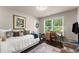 Bright bedroom with a daybed, desk, and ample natural light at 2751 Pilgrim Mill Rd, Cumming, GA 30041