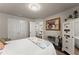Inviting bedroom with a comfortable bed, neutral tones, and ample closet space at 2751 Pilgrim Mill Rd, Cumming, GA 30041