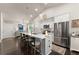 Spacious kitchen with a large island, stainless steel appliances, and white cabinetry at 2751 Pilgrim Mill Rd, Cumming, GA 30041