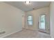 Bedroom with neutral carpet and a back door at 3587 Hidden Valley Cir, Lawrenceville, GA 30044