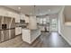 Kitchen featuring stainless steel appliances, granite countertops, and access to the outdoors at 3587 Hidden Valley Cir, Lawrenceville, GA 30044