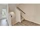 Staircase and back door with hardwood flooring at 3587 Hidden Valley Cir, Lawrenceville, GA 30044