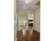 Hallway featuring hardwood floors that lead to the bedrooms at 5783 Poppy Tree Ln, Tucker, GA 30084