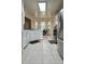 Bright kitchen with modern appliances and white cabinetry, including a cozy dining area at 5783 Poppy Tree Ln, Tucker, GA 30084