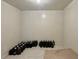 Spacious room with tiled floor, ideal for storage or customization at 5783 Poppy Tree Ln, Tucker, GA 30084