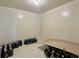 Unfurnished room with tile flooring suitable for customization and storage at 5783 Poppy Tree Ln, Tucker, GA 30084