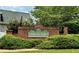 Brick sign for 'Parkview Pointe' surrounded by lush landscaping at 5783 Poppy Tree Ln, Tucker, GA 30084