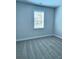 Cozy bedroom with neutral paint, blinds, and plush gray carpeting at 1695 Crumbley Rd, Mcdonough, GA 30252
