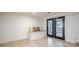 Basement with built-in bench seating and double doors leading to the outside at 2825 Shea Sw Way, Marietta, GA 30060