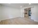Finished basement offers light wood flooring and a cozy window seat with barn door access at 2825 Shea Sw Way, Marietta, GA 30060