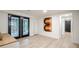 Finished basement with a walkout to a back patio and unique wall art at 2825 Shea Sw Way, Marietta, GA 30060