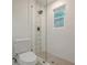 Modern bathroom with a glass-enclosed shower, stylish tile accents, and contemporary fixtures for a refreshing experience at 2825 Shea Sw Way, Marietta, GA 30060