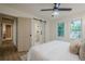Bright bedroom with convenient access to an ensuite bathroom through a stylish sliding barn door, adding character to the space at 2825 Shea Sw Way, Marietta, GA 30060
