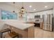 Bright kitchen features stainless steel appliances, white countertops, and wooden cabinets at 2825 Shea Sw Way, Marietta, GA 30060